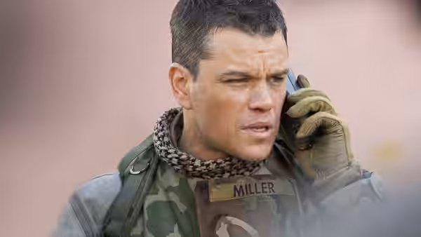 Roy Miller (Matt Damon) speaks into a radio in military gear