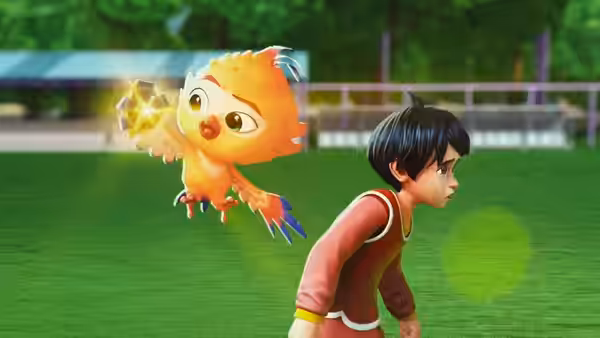 A boy bends forward on a soccer field as a glowing little bird hovers behind him
