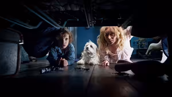 Samuel (Noah Wiseman), Amelia (Essie Davis) and dog hiding under the bed