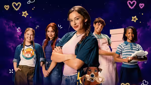 A group of young people pose with a dog against a starry illustrated backdrop