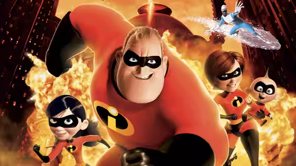 Mr. Incredible (Craig T. Nelson) charging forward with his family and Frozone amid explosions