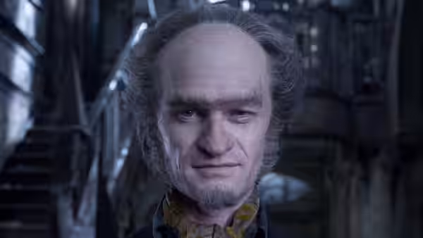 Count Olaf (Neil Patrick Harris) stands before a shadowy staircase