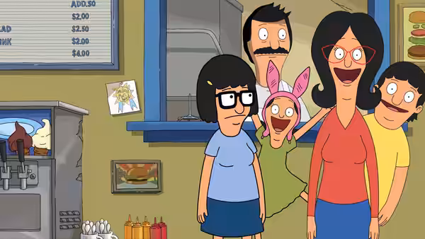 Tina, Louise, Linda, Bob, and Gene Belcher gather smiling inside the restaurant