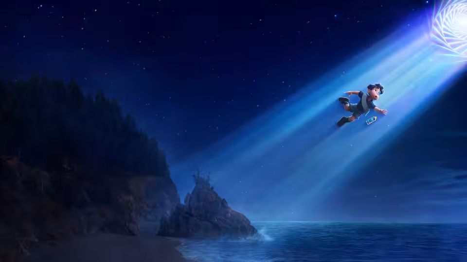 Elio (Yonas Kibreab) being pulled skyward by a glowing portal over water at night