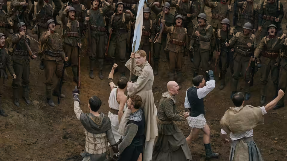 A woman stands among civilians facing a gathered line of uniformed soldiers