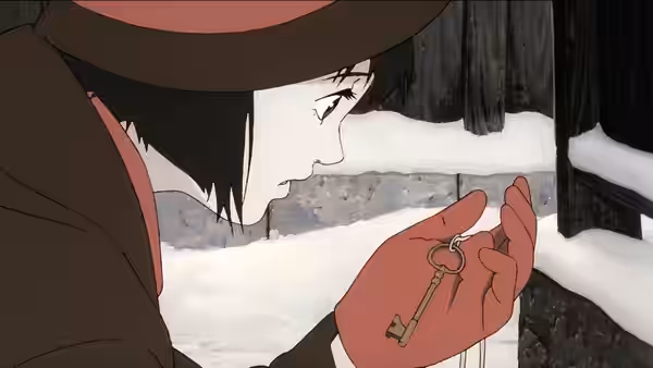 woman in brown hat and red gloves holding brass key in snowy setting