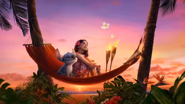 Lilo (Maia Kealoha) and Stitch relaxing together in a hammock at sunset