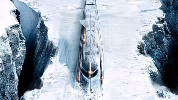 A long train speeds between steep walls of ice and snow