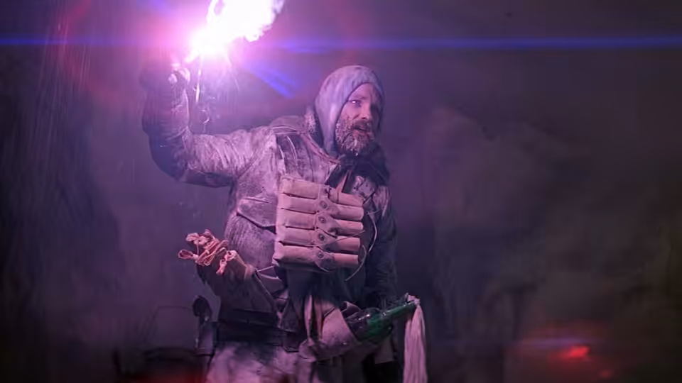 MacReady (Kurt Russell) raising a bright flare in a dark icy cave
