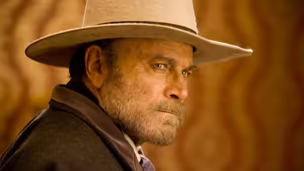 Dr. King Schultz (Christoph Waltz) in a white hat looking to one side