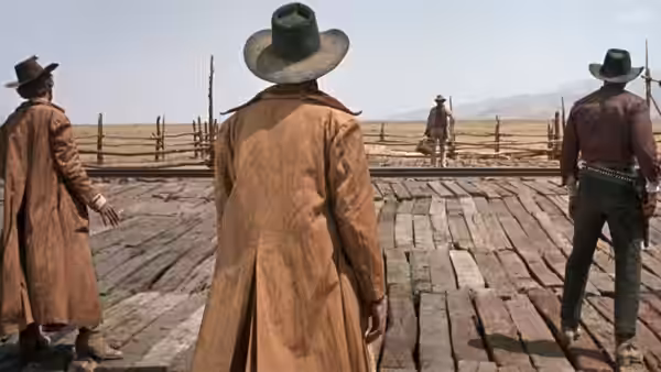 Three cowboys stand on a wooden platform facing a distant figure across the plain