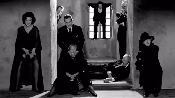 A group of formally dressed figures gathers around a doorway