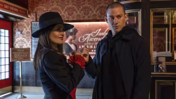 Maxandra Mendoza (Salma Hayek) and Mike Lane (Channing Tatum) stand in a theater lobby