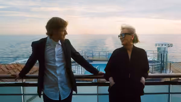 Tyler Hughes (Lucas Hedges) and Alice Hughes (Meryl Streep) on a ship deck