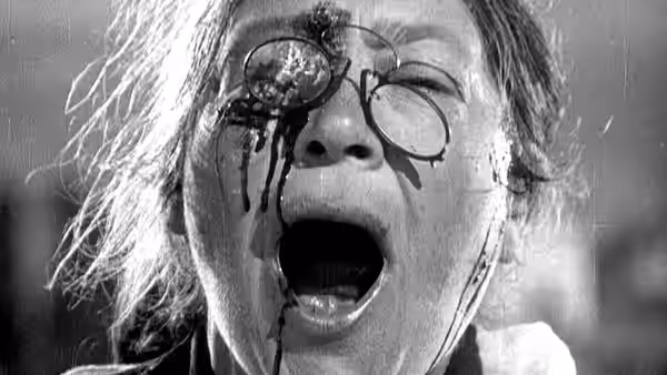 Woman with pince-nez (Nina Poltavtseva) screaming with mouth wide open
