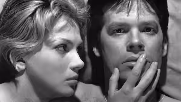 Krystyna Rozbicka (Ewa Krzyżewska) touches Maciek Chełmicki’s face at close range