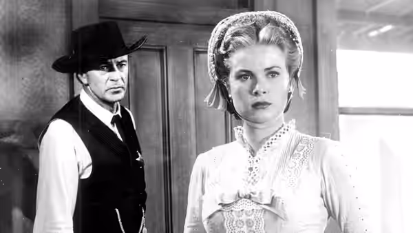 Amy Fowler Kane (Grace Kelly) with Will Kane (Gary Cooper) behind her