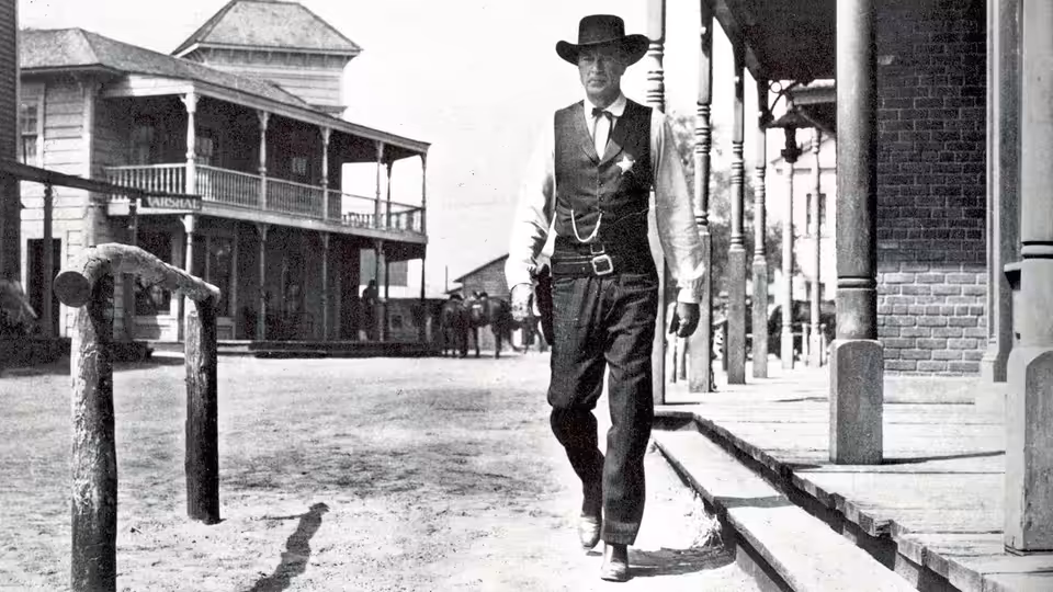 Will Kane (Gary Cooper) walking alone down the empty main street