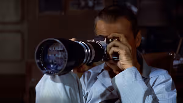 L.B. Jefferies (James Stewart) looking through a large camera lens