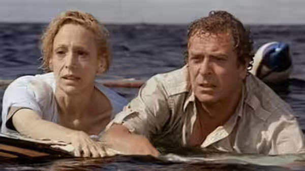 Ellen Brody (Lorraine Gary) and Hoagie Newcombe (Michael Caine) in the ocean