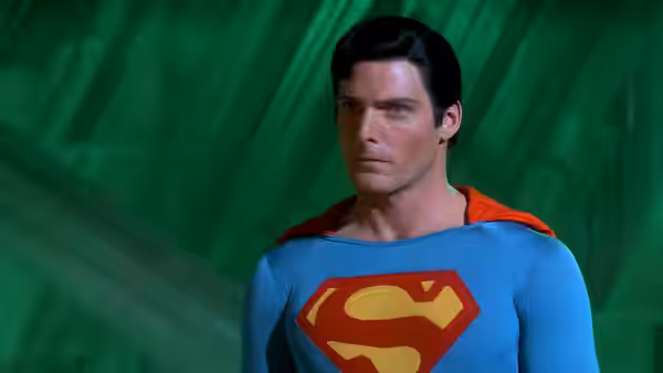 Superman (Christopher Reeve) looks ahead with a serious expression