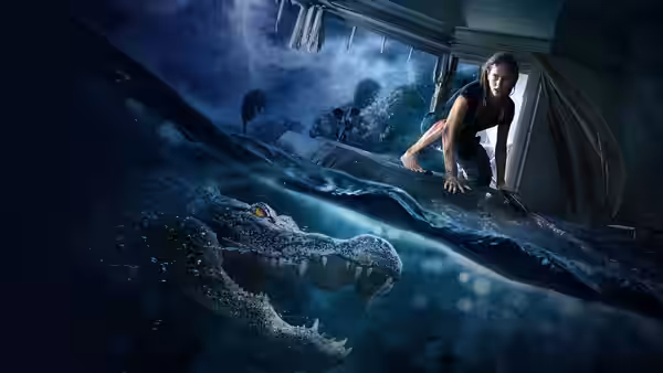 Haley (Kaya Scodelario) crawls through a wrecked building as a crocodile swims below