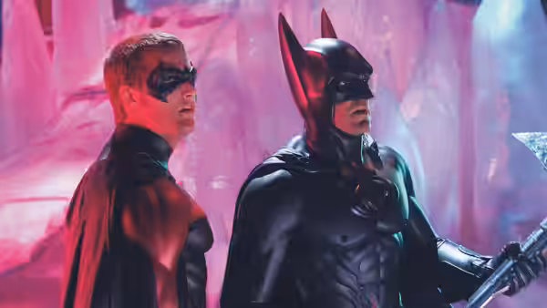 Robin (Chris O'Donnell) and Batman (George Clooney) in a pink icy cave