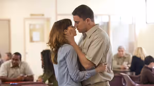 Emily Taylor (Rooney Mara) embracing Martin Taylor (Channing Tatum) in a prison visitation room