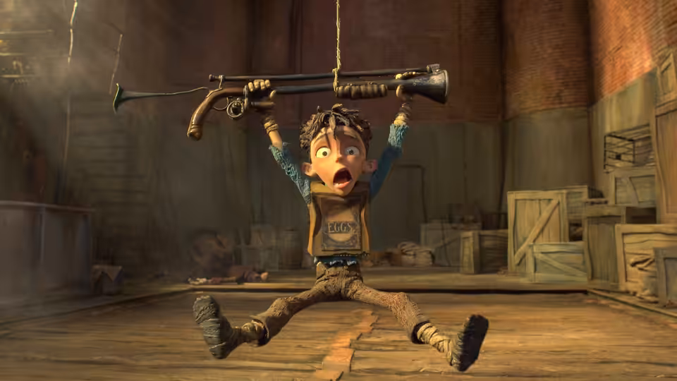 Eggs (Isaac Hempstead Wright) hangs from a rifle in a cluttered wooden room
