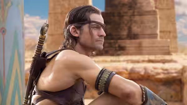 Horus (Nikolaj Coster-Waldau) sits among ancient ruins with a sword on his back