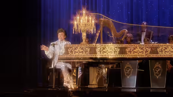 Liberace (Michael Douglas) at the piano during a concert performance
