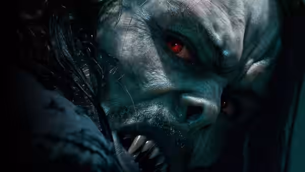 A fanged vampire creature with glowing red eyes baring teeth
