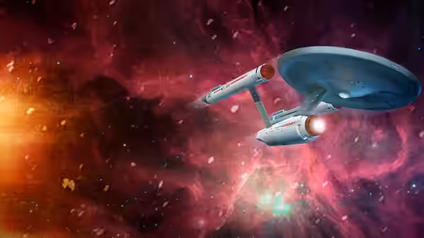 Starship Enterprise moving through a red and purple nebula