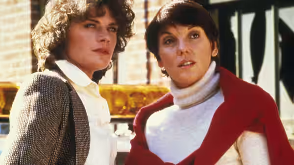 Christine Cagney (Sharon Gless) and Mary Beth Lacey (Tyne Daly) standing together outdoors