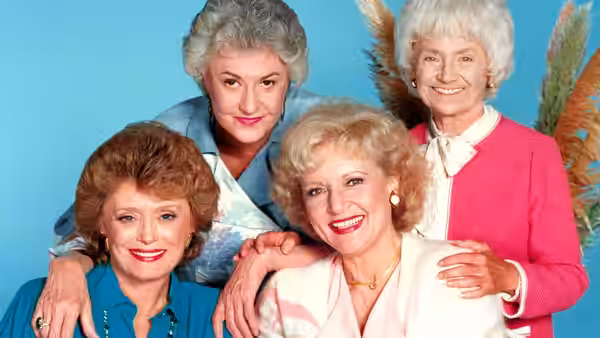 Dorothy (Bea Arthur), Rose (Betty White), Blanche (Rue McClanahan) and Sophia (Estelle Getty) in a group embrace