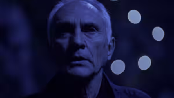 Close-up of Wilson (Terence Stamp) with a serious expression