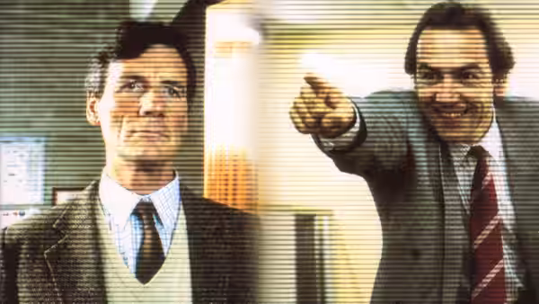 Michael Palin as Jim Nelson beside Robert Lindsay as Michael Murray pointing