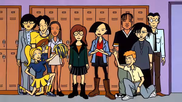 Group of students posing together in front of school lockers