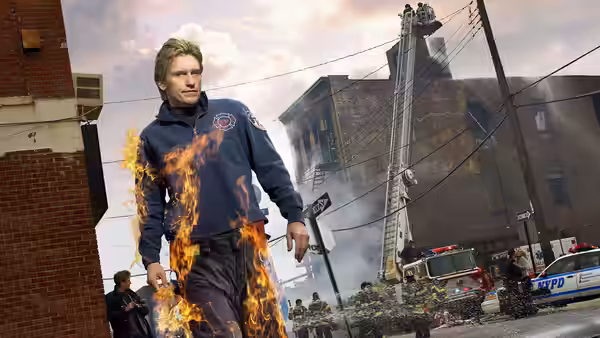 Tommy Gavin (Denis Leary) walking while on fire past a burning building