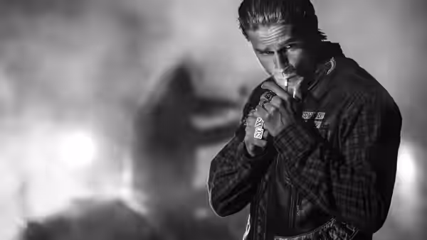 Jax Teller (Charlie Hunnam) lighting a cigarette with both hands