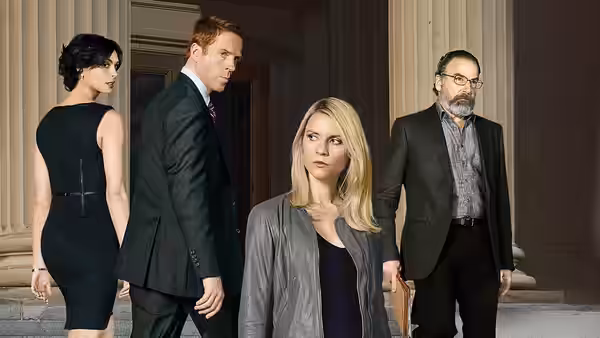 Carrie Mathison (Claire Danes) with colleagues outside a columned building entrance
