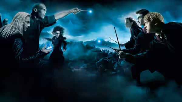 Bellatrix Lestrange (Helena Bonham Carter) dueling Harry Potter (Daniel Radcliffe) in a misty chamber