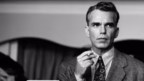 Ed Crane (Billy Bob Thornton) holding a cigarette and looking aside