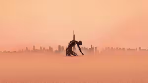 A dark robotic figure kneels alone in a vast desert with a distant city skyline behind