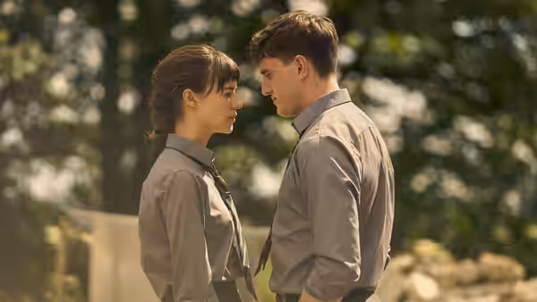 Connell (Paul Mescal) and Marianne (Daisy Edgar-Jones) in school uniforms facing each other