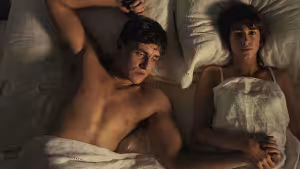 Connell (Paul Mescal) and Marianne (Daisy Edgar-Jones) lying together in bed