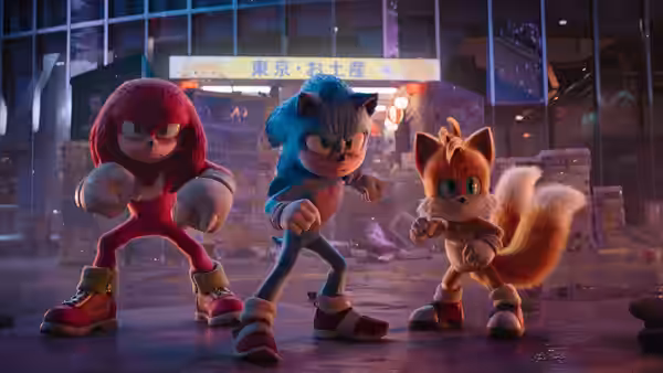 Knuckles, Sonic and Tails in fighting stances on a rainy street