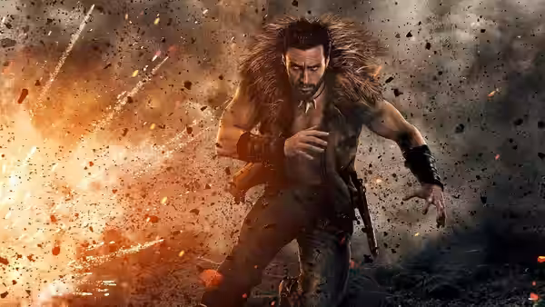 Kraven the Hunter (Aaron Taylor-Johnson) running through a fiery explosion